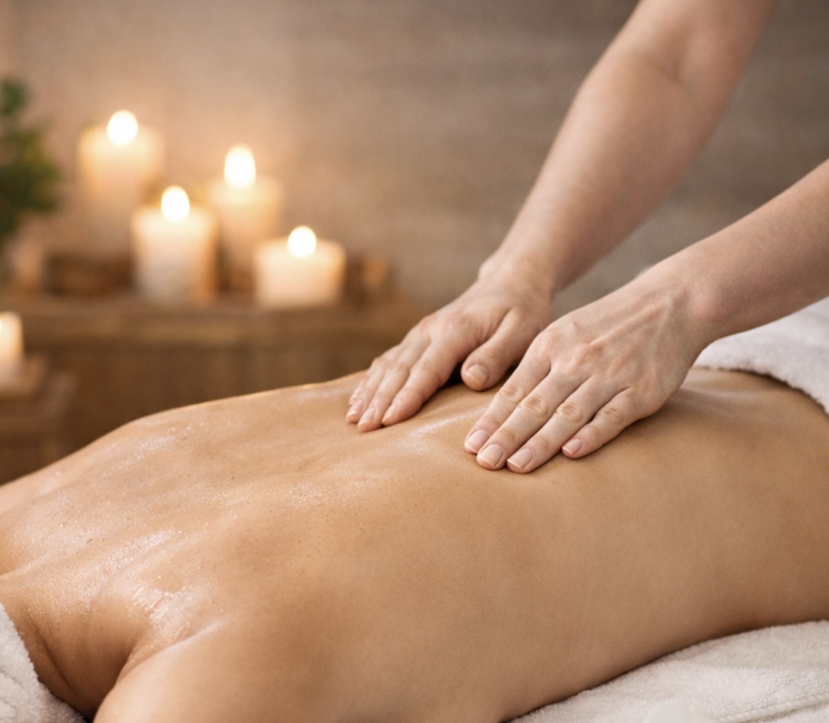 Therapist hands massaging shoulder